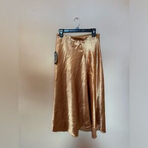 Gold midi satin skirt from boutique